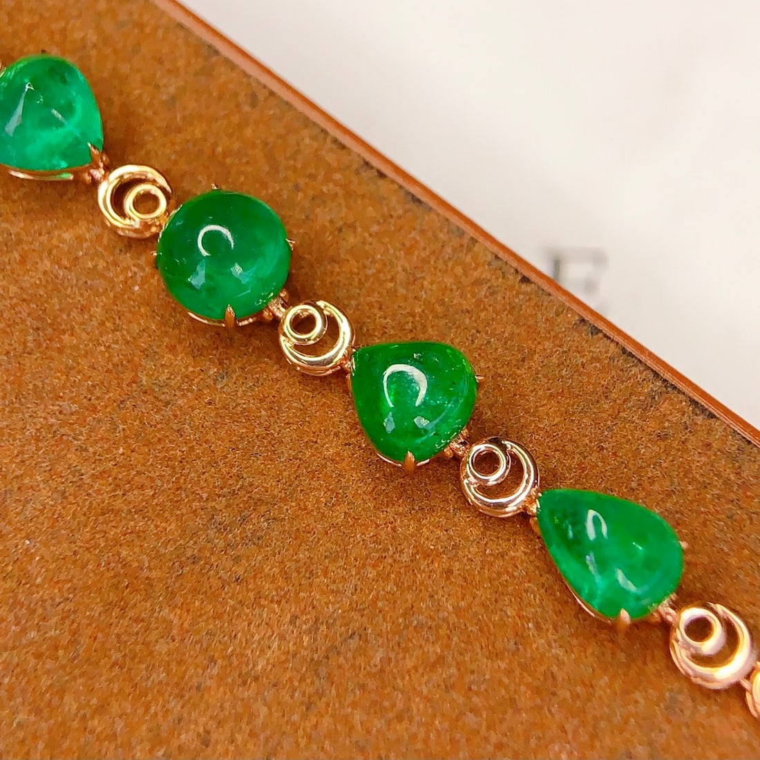 14k Gold 7.5 Ct Natural Emerald Bracelet: Ref:231114371 // gold content:14k gold // main gemstone:emerald // shape:multiple // carat weight:7. 5ct // color:green // treatment:natural // Condition: New Low Estimate: 15000.00 High Estimate: