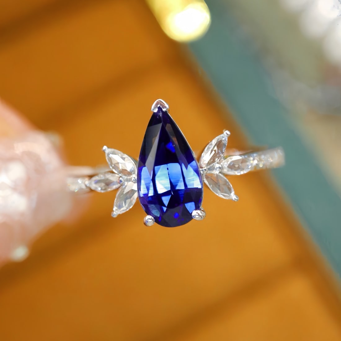14k Gold 1.40 Ctw Natural Sapphire & Diamond Ring: Ref:231114400 // gold content:14k gold // ring size:7. 25us // // main gemstone:sapphire // shape:pear // carat weight:1. 26ct // color:blue // treatment:natural // // adjacent gemstone 2 : diamond