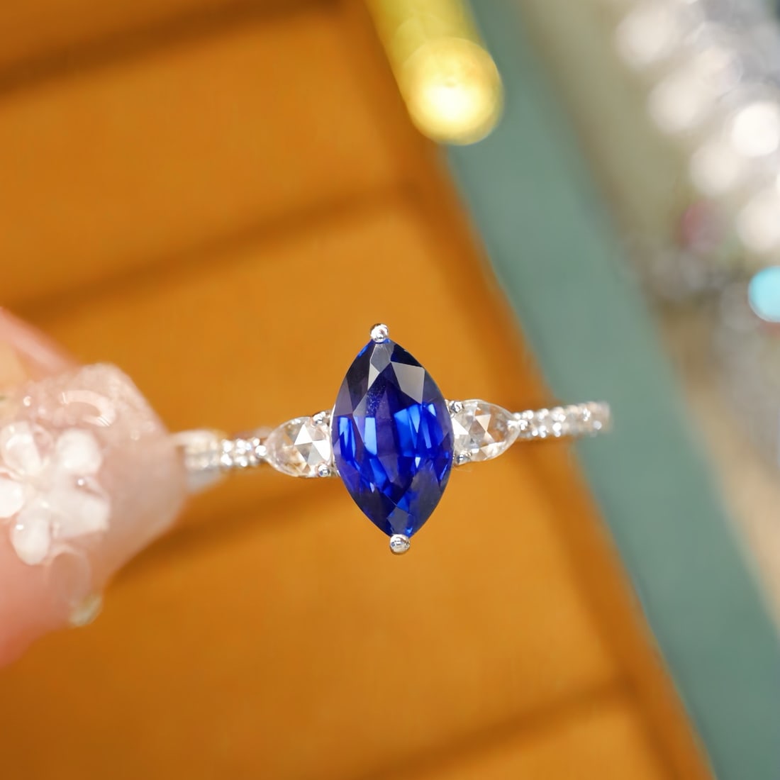 14k Gold 1.26 Ctw Natural Sapphire & Diamond Ring: Ref:231114420 // gold content:14k gold // ring size:7. 25us // // main gemstone:sapphire // shape:marquise // carat weight:1. 15ct // color:blue // treatment:natural // // adjacent gemstone 2 :