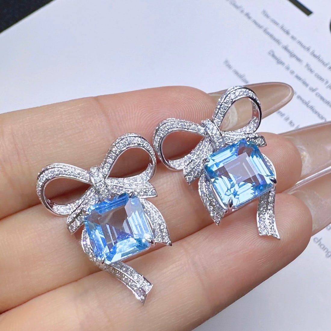 14k Gold 9.04 Ctw Natural Aquamarine & Diamond Earrings: Ref:231114435 // gold content:14k gold // main gemstone:aquamarine // shape:asscher // carat weight:7. 98ct // color:blue // treatment:natural // // adjacent gemstone 2 : diamond // shape:round //