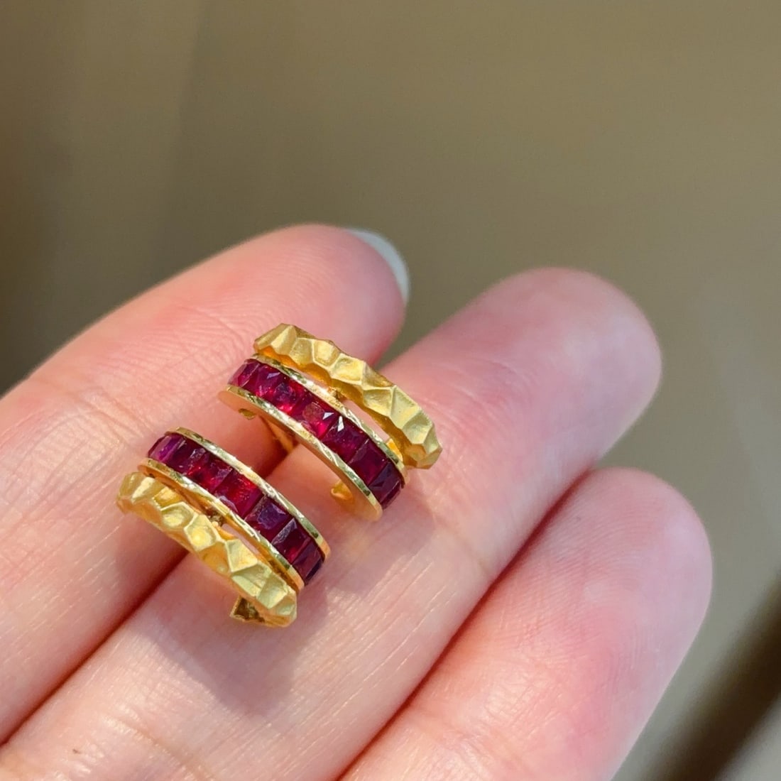 14k Gold 2 Ct Natural Ruby Earrings: Ref:231114440 // gold content:14k gold // main gemstone:ruby // shape:princess // carat weight:2ct // color:red // treatment:natural // Condition: New Low Estimate: 4600.00 High Estimate: 6900.00