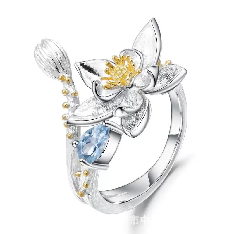 925 Sterling Silver Natural Topaz & Flowers Ring: Ref:260821029 // gold content:925 sterling silver // ring size:7. 25us // // main gemstone:topaz // shape:pear // carat weight:0. 50ct // color:blue // treatment:natural // Condition: New Low