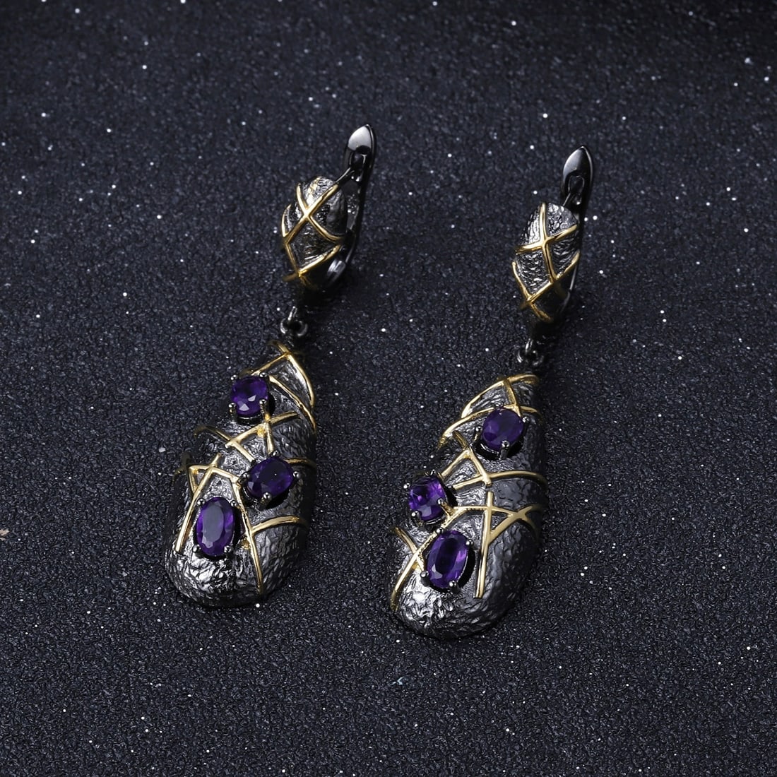 925 Sterling Silver Natural Amethyst Earrings: Ref:260821044 // gold content:925 sterling silver // main gemstone:amethyst // shape:oval // carat weight:0. 50ct // color:purple // treatment:natural // Condition: New Low Estimate: 500.00 High