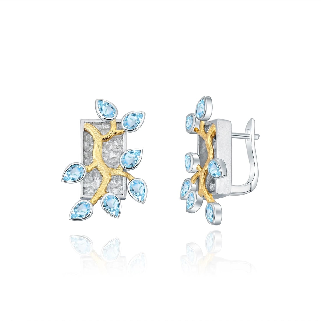 925 Sterling Silver Natural Topaz Earrings: Ref:260821076 // gold content:925 sterling silver // main gemstone:topaz // number of stones:14 // shape:pear // carat weight:0. 50ct // color:blue // treatment:natural // Condition: New Low Estimate: