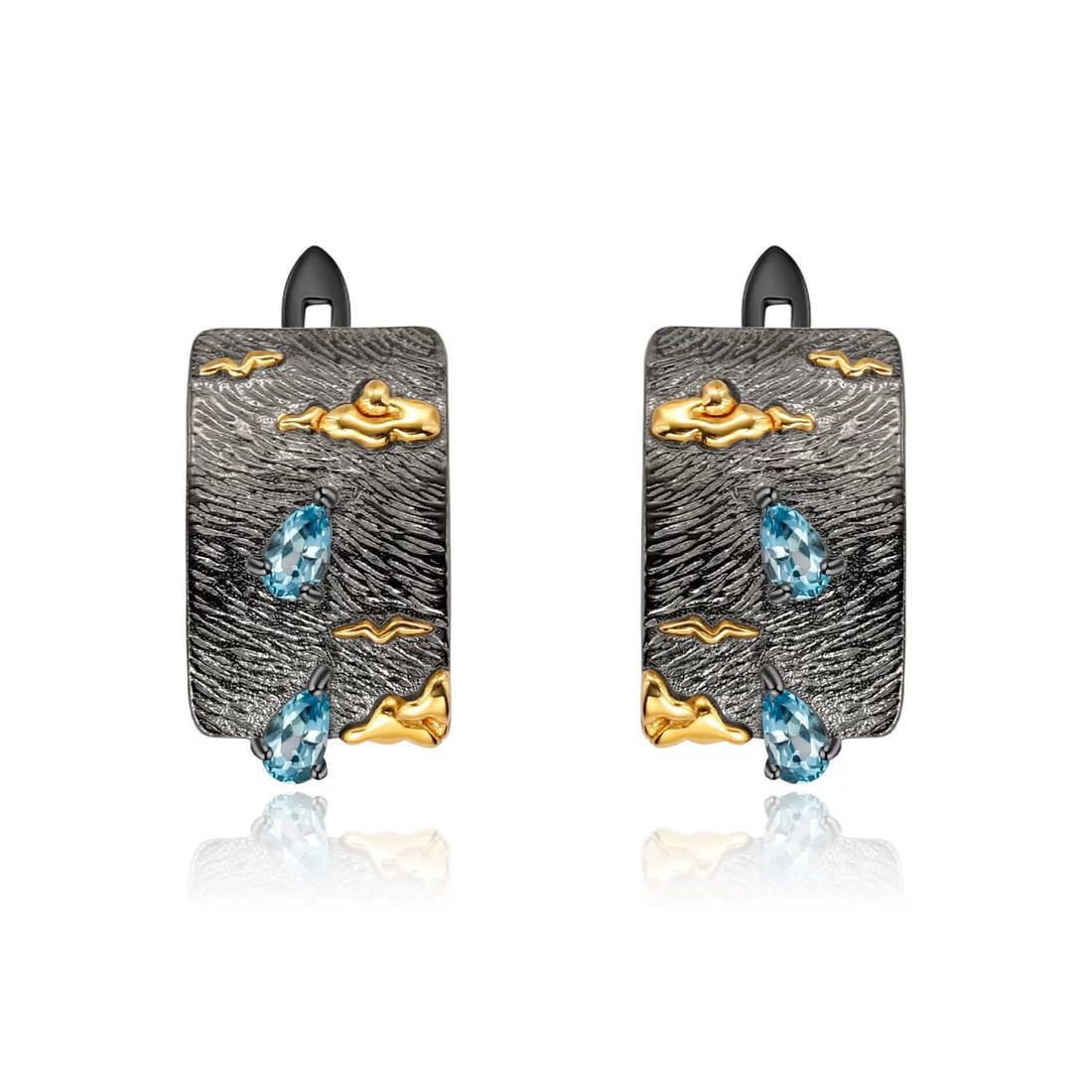 925 Sterling Silver Natural Topaz Earrings: Ref:260821087 // gold content:925 sterling silver // main gemstone:topaz // shape:pear // carat weight:0. 50ct // color:blue // treatment:natural // High Estimate: 710 Condition: New Low Estimate: 470