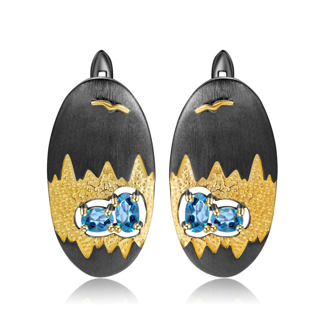 925 Sterling Silver Natural Topaz Earrings: Ref:260821202 // gold content:925 sterling silver // main gemstone:topaz // shape:oval // carat weight: // color:blue // treatment:natural // Condition: New Low Estimate: 420.00 High Estimate: 630.00