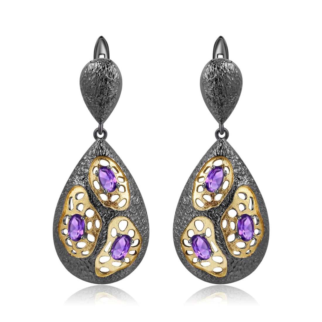925 Sterling Silver Natural Amethyst Earrings: Ref:260821209 // gold content:925 sterling silver // main gemstone:amethyst // shape:oval // carat weight: // color:purple // treatment:natural // Condition: New Low Estimate: 490.00 High Estimate:
