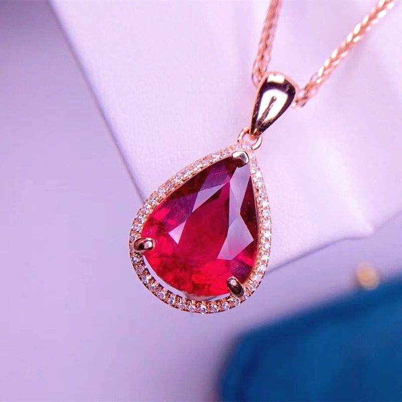 14k Gold 3.8 Ct Natural Tourmaline & Diamond Pendant( Without Chain ): Ref:230967018 // gold content:14k gold // main gemstone:tourmaline // shape:pear // carat weight:3. 8ct // color:red // treatment:natural // // adjacent gemstone 2 : diamond // shape:round // clarity