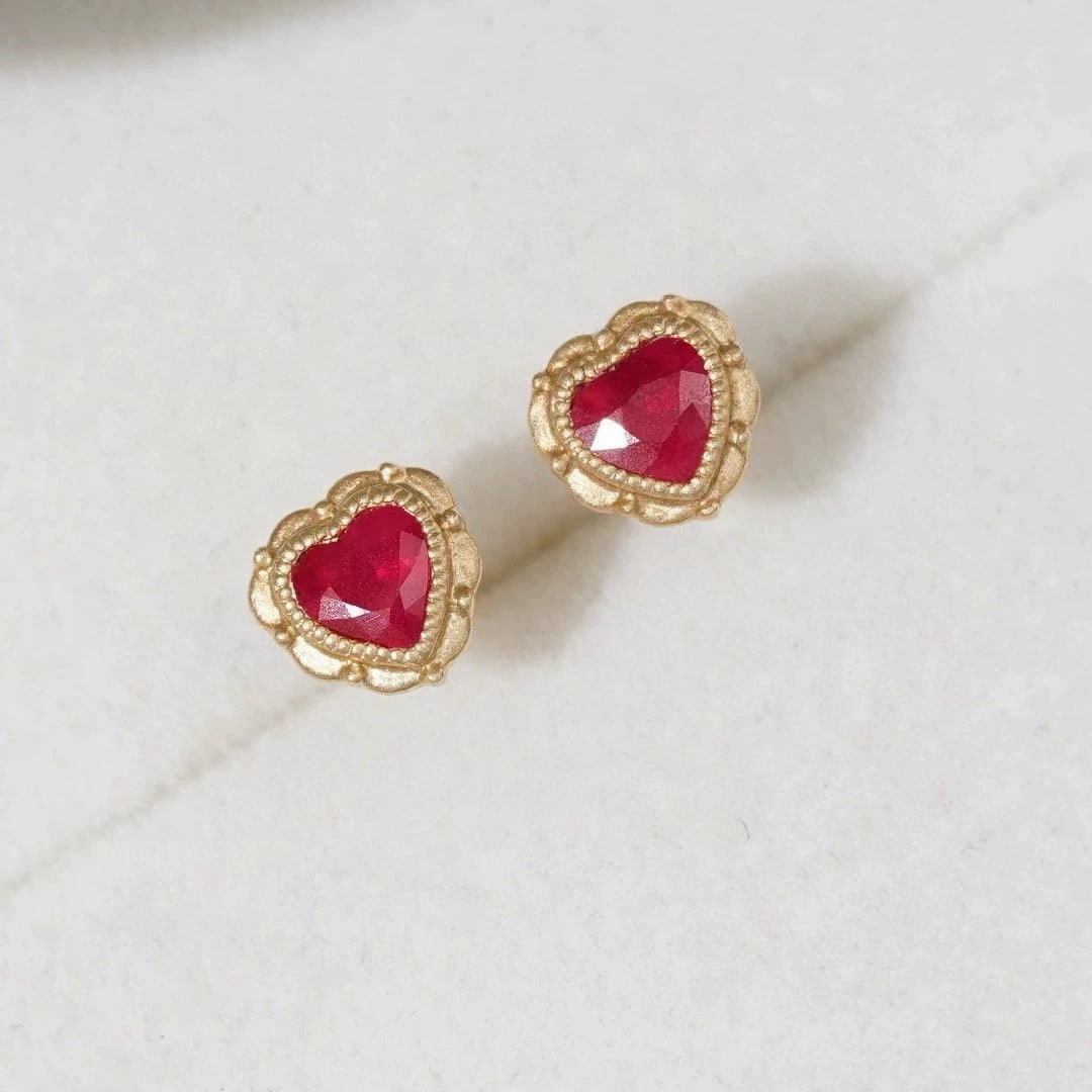 14k Gold 0.5 Ct Natural Ruby Earrings: Ref:230967024 // gold content:14k gold // main gemstone:ruby // shape:heart // carat weight:0. 5ct // color:red // treatment:natural // Condition: New High Estimate: 2600 Low Estimate: 1800