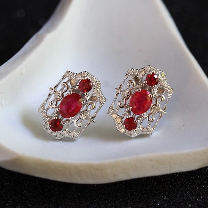 14k Gold 1.02 Ctw Natural Ruby & Diamond Earrings: Ref:230967094 // gold content:14k gold // main gemstone:ruby // shape:multiply // carat weight:0. 87ct // color:pigeonblood red // treatment:natural // // adjacent gemstone 2 : diamond // shape:round 