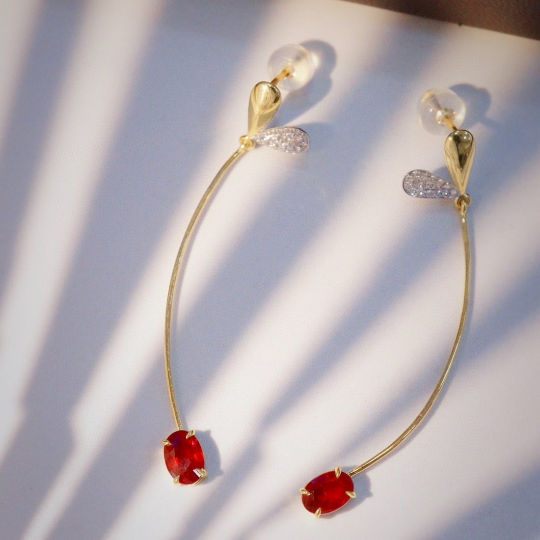 14k Gold 1.48 Ctw Vivid Red Natural Ruby & Diamond Earrings: Ref:230967115 // gold content:14k gold // main gemstone:ruby // shape:oval // carat weight:1. 37ct // color:vivid red // treatment:natural // // adjacent gemstone 2 : diamond // shape:round // carat