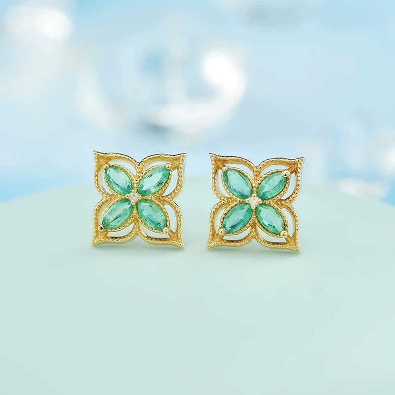 14k Gold 0.58 Ctw Natural Emerald & Diamond Earrings: Ref:230967101 // gold content:14k gold // main gemstone:emerald // shape:marquise // carat weight:0. 57ct // color:green // treatment:natural // // adjacent gemstone 2 : diamond // shape:round //
