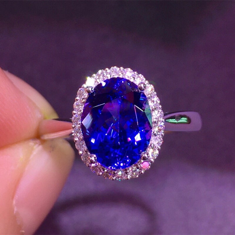 14k Gold 2.9 Ct Natural Tanzanite & Diamond Ring: Ref:230967099 // gold content:14k gold // ring size:7. 25us // // main gemstone:tanzanite // shape:oval // carat weight:2. 9ct // color:blue // treatment:natural // // adjacent gemstone 2 : diamond