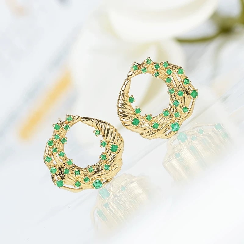 14k Gold 0.68 Ct Natural Emerald Earrings: Ref:230967113 // gold content:14k gold // main gemstone:emerald // shape:round // carat weight:0. 68ct // color:green // treatment:natural // cut grade:g // Condition: New Low Estimate: 5100 High