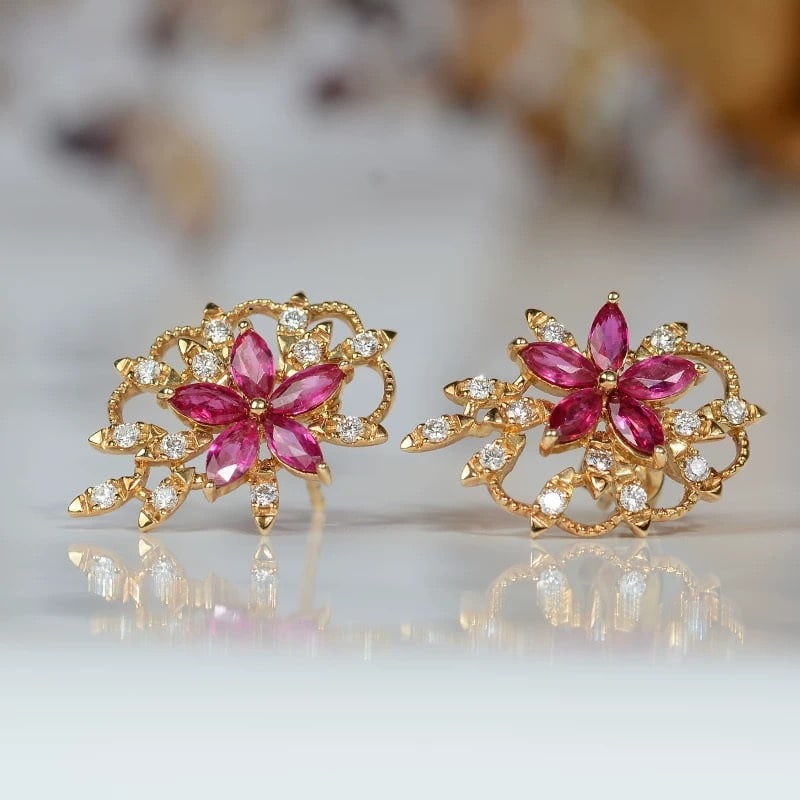 14k Gold 1.89 Ctw Natural Ruby & Diamond Earrings: Ref:230967118 // gold content:14k gold // main gemstone:ruby // shape:marquise // carat weight:1. 51ct // color:red // treatment:natural // // adjacent gemstone 2 : diamond // shape:round // carat