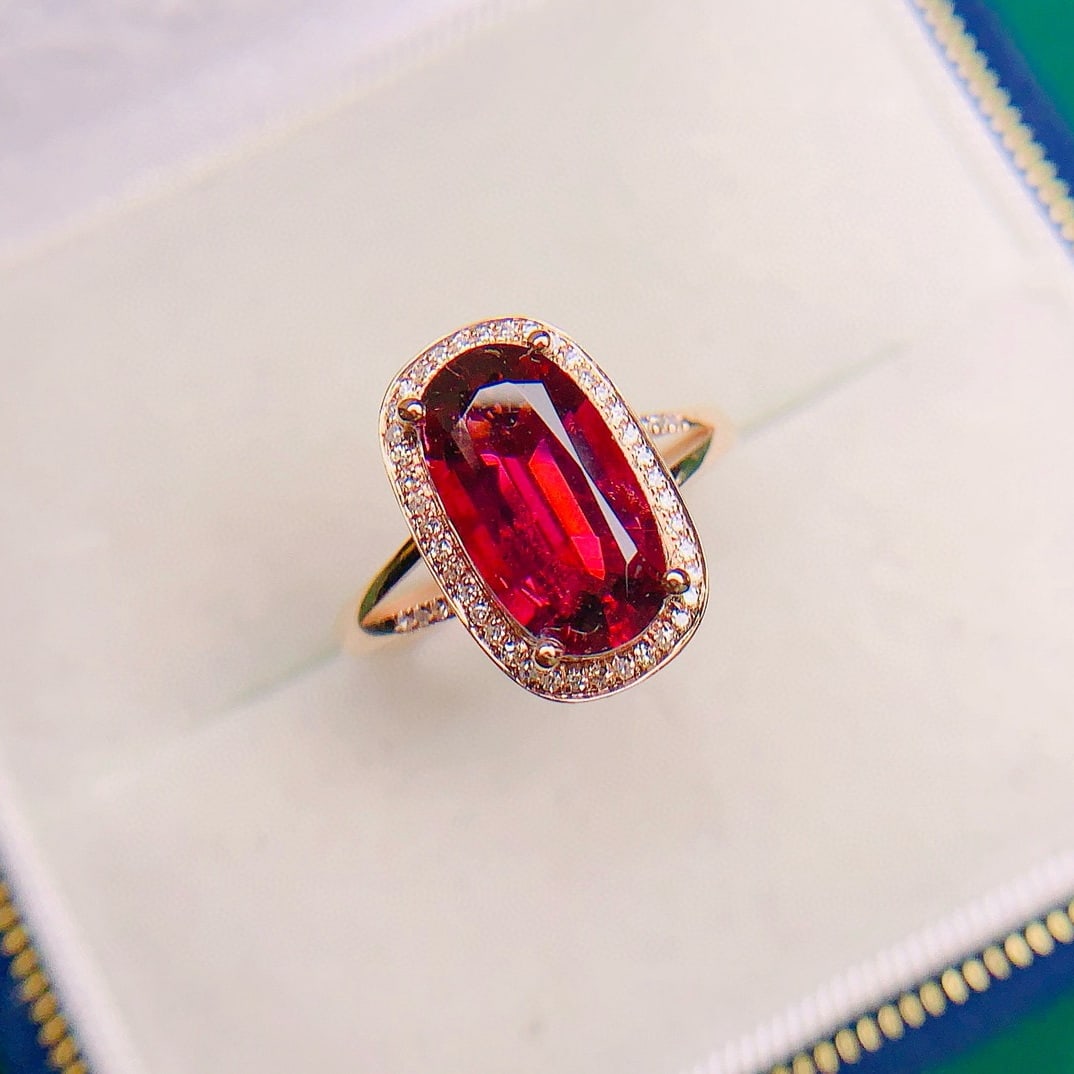 14k Gold 3.09 Ctw Natural Tourmaline & Diamond Ring: Ref:230967192 // gold content:14k gold // ring size:7. 25us // // main gemstone:tourmaline // shape:oval // carat weight:2. 95ct // color:red // treatment:natural // // adjacent gemstone 2 : diamond