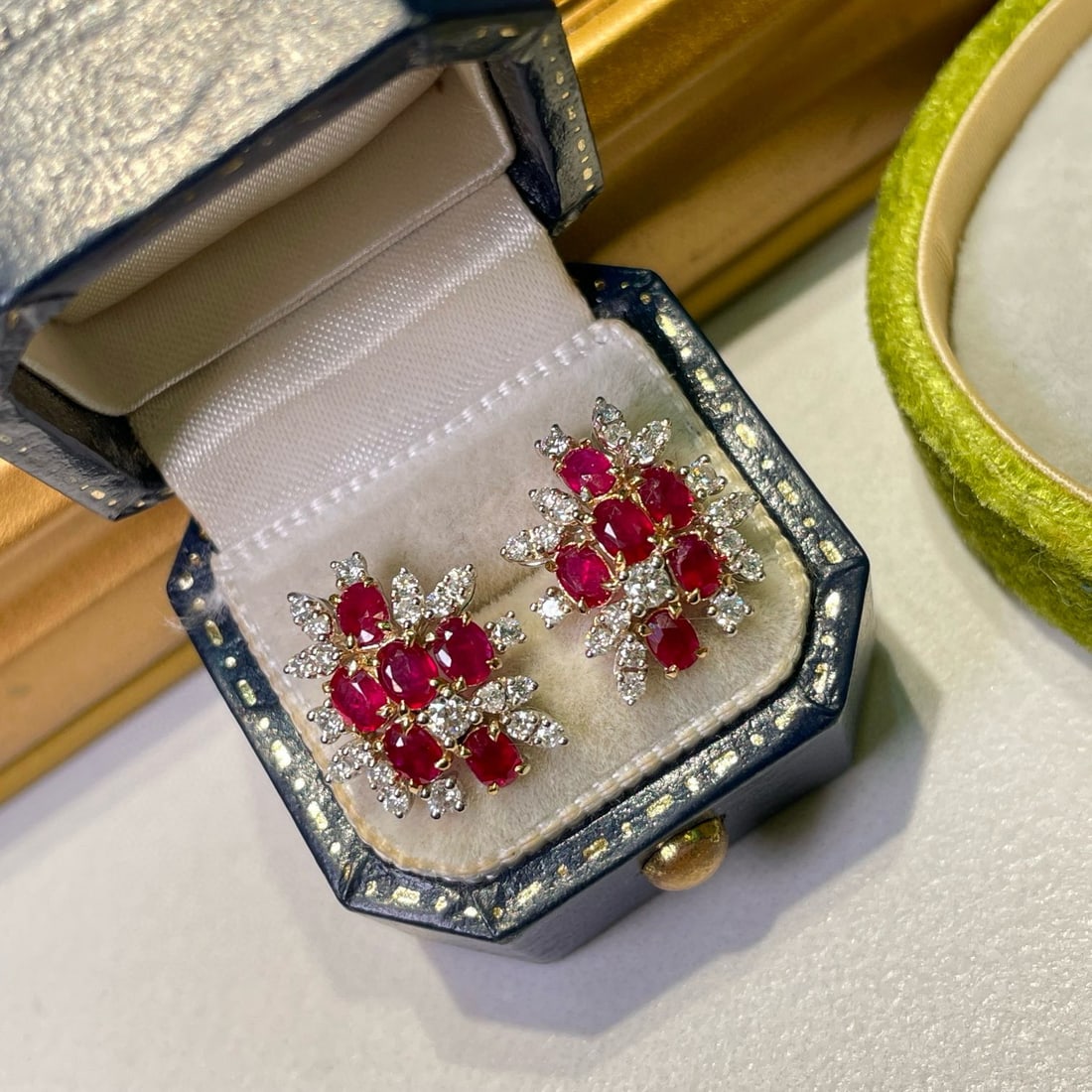 14k Gold 1.3 Ct Natural Ruby & Diamond Earrings: Ref:230967218 // gold content:14k gold // main gemstone:ruby // shape:oval // carat weight:1. 3ct // color:red // treatment:natural // // adjacent gemstone 2 : diamond // shape:round // clarity grade: