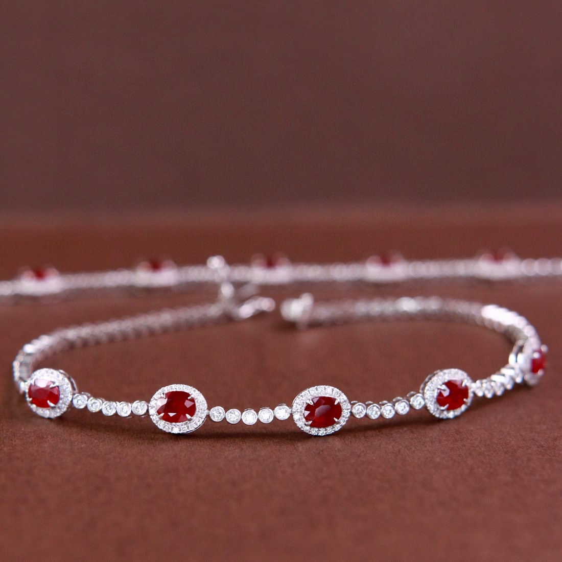 14k Gold 1.93 Ctw Natural Ruby & Diamond Bracelet: Ref:230968079 // gold content:14k gold // main gemstone:ruby // shape:oval // carat weight:1. 54ct // color:pigeonblood red // treatment:natural // // adjacent gemstone 2 : diamond // shape:round //