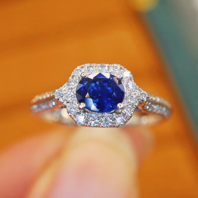 14k Gold 0.96 Ctw Natural Sapphire & Diamond Ring: Ref:230968083 // gold content:14k gold // ring size:7. 25us // // main gemstone:sapphire // shape:oval // carat weight:0. 68ct // color:royal blue // treatment:natural // // adjacent gemstone 2 :