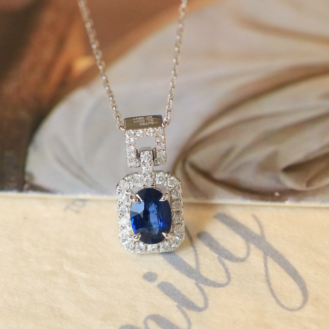 14k Gold 1.26 Ctw Natural Sapphire & Diamond Pendant( Without Chain ): Ref:230968135 // gold content:14k gold // main gemstone:sapphire // shape:oval // carat weight:1ct // color:royal blue // treatment:natural // // adjacent gemstone 2 : diamond // shape:round // carat