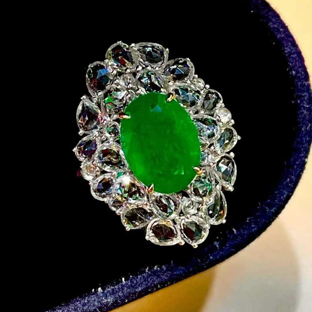 14k Gold 3.35 Ct Vivid Green Natural Emerald & Sapphire Ring: Ref:230968193 // gold content:14k gold // ring size:7. 25us // // main gemstone:emerald // shape:oval // carat weight:3. 35ct // color:vivid green // treatment:natural // // adjacent gemstone 2 :