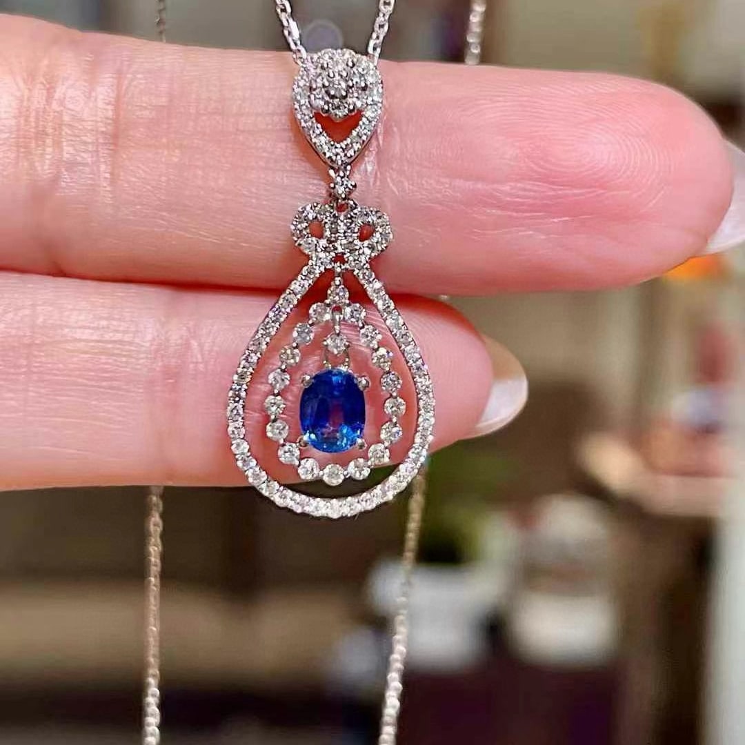14k Gold 1.07 Ctw Natural Sapphire & Diamond Pendant( Without Chain ): Ref:230968155 // gold content:14k gold // main gemstone:sapphire // shape:oval // carat weight:0. 52ct // color:blue // treatment:natural // // adjacent gemstone 2 : diamond // shape:round // carat