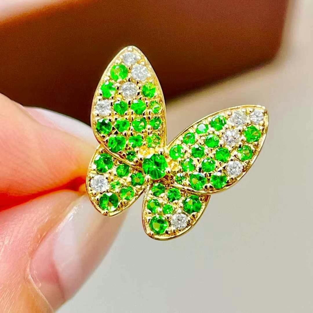 14k Gold 0.92 Ctw Natural Tsavorite & Diamond & Butterfly Ring: Ref:230968201 // gold content:14k gold // ring size:7. 25us // // main gemstone:tsavorite // shape:round // carat weight:0. 75ct // color:green // treatment:natural // // adjacent gemstone 2 :
