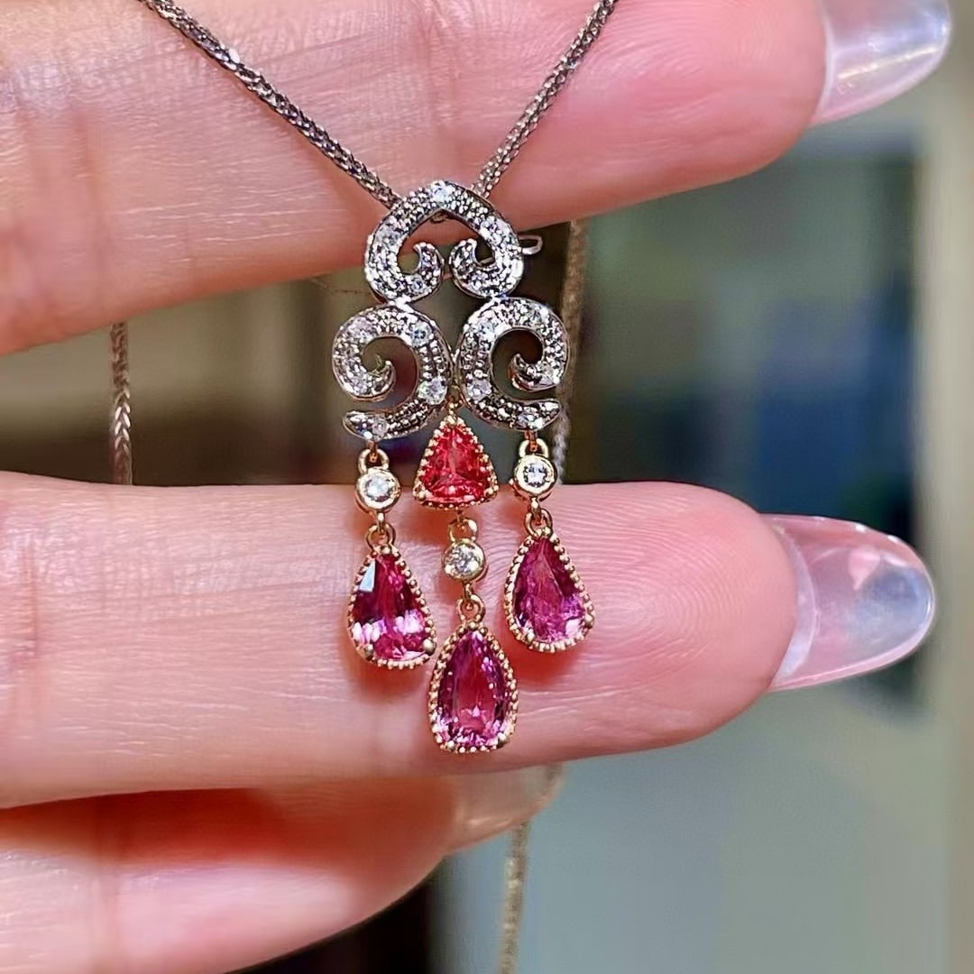 14k Gold 1.20 Ctw Natural Padparadscha Sapphire & Diamond Pendant( Without Chain ): Ref:230968168 // gold content:14k gold // main gemstone:padparadscha sapphire // shape:pear // carat weight:1. 09ct // color:orangish pink // treatment:natural // // adjacent gemstone 2 : diamond //