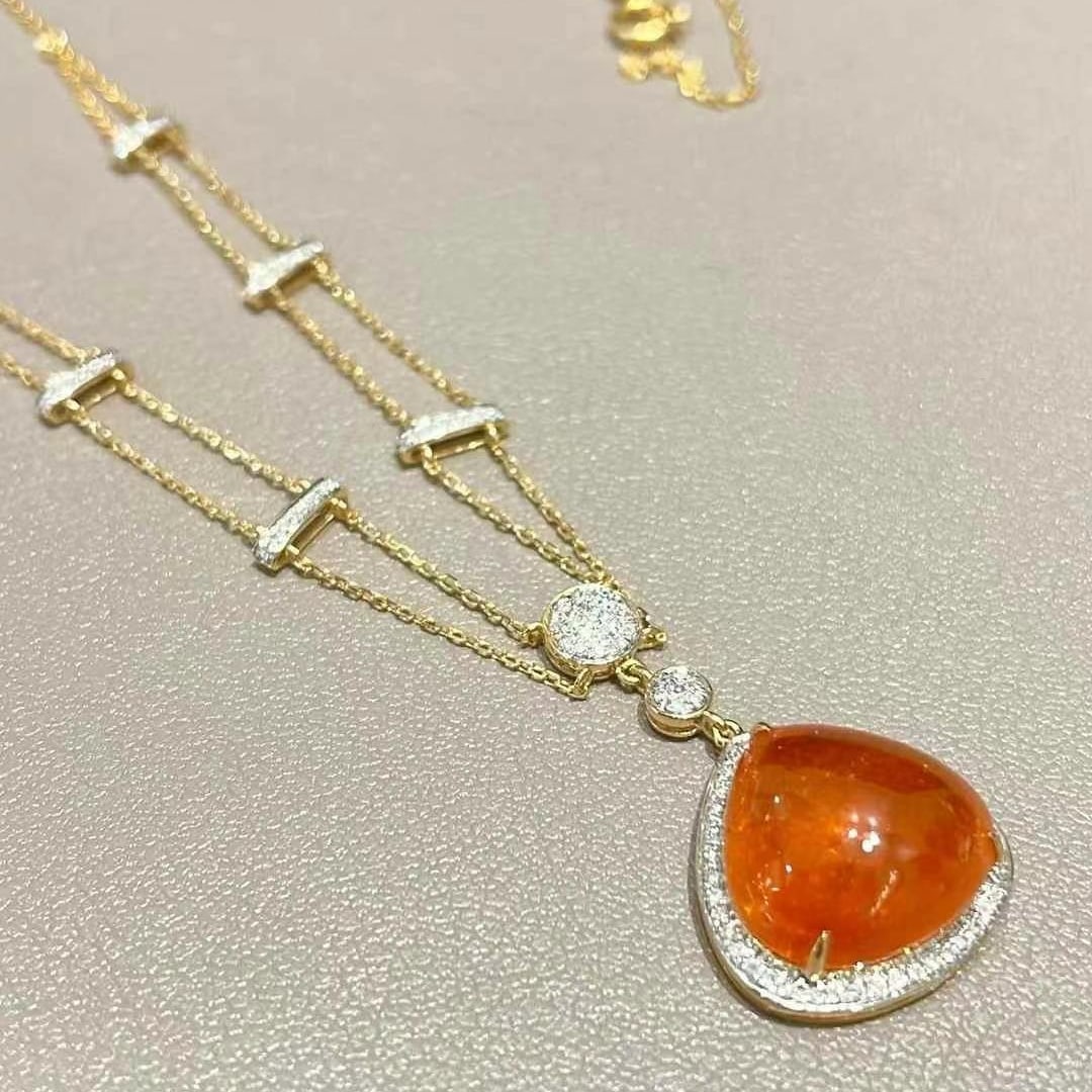 14k Gold 9.7 Ct Natural Spessartine & Diamond Necklace: Ref:230968196 // gold content:14k gold // main gemstone:spessartine // shape:pear // carat weight:9. 7ct // color:orange // treatment:natural // // adjacent gemstone 2 : diamond // shape:round //