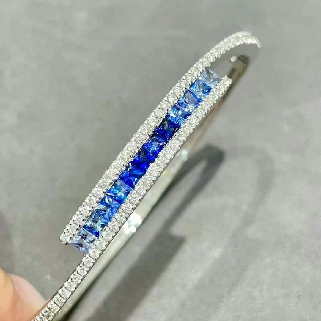 14k Gold 2.25 Ctw Natural Sapphire & Diamond Bangle: Ref:230968195 // gold content:14k gold // main gemstone:sapphire // shape:princess // carat weight:1. 5ct // color:blue // treatment:natural // // adjacent gemstone 2 : diamond // shape:round //