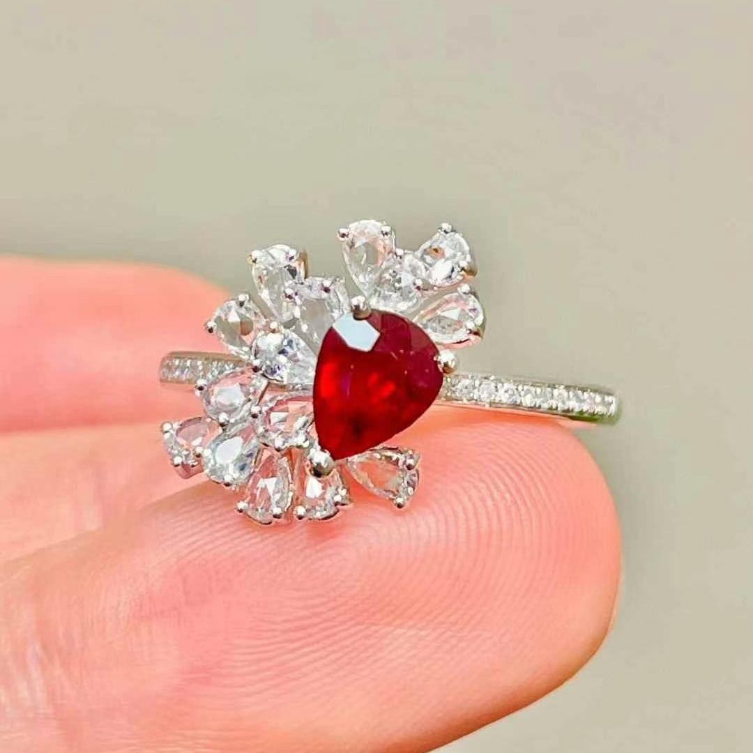 14k Gold 0.7 Ct Natural Ruby & Diamond & Sapphire Ring: Ref:230968203 // gold content:14k gold // ring size:7. 25us // // main gemstone:ruby // shape:pear // carat weight:0. 7ct // color:pigeonblood red // treatment:natural // // adjacent gemstone 2 :