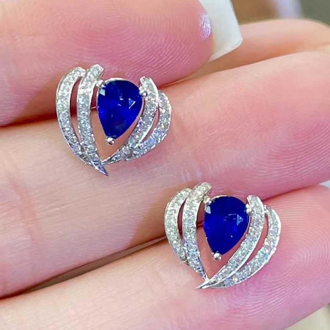 14k Gold 1.1 Ct Natural Sapphire & Diamond Earrings: Ref:230968212 // gold content:14k gold // main gemstone:sapphire // shape:pear // carat weight:1. 1ct // color:royal blue // treatment:natural // // adjacent gemstone 2 : diamond // shape:round //