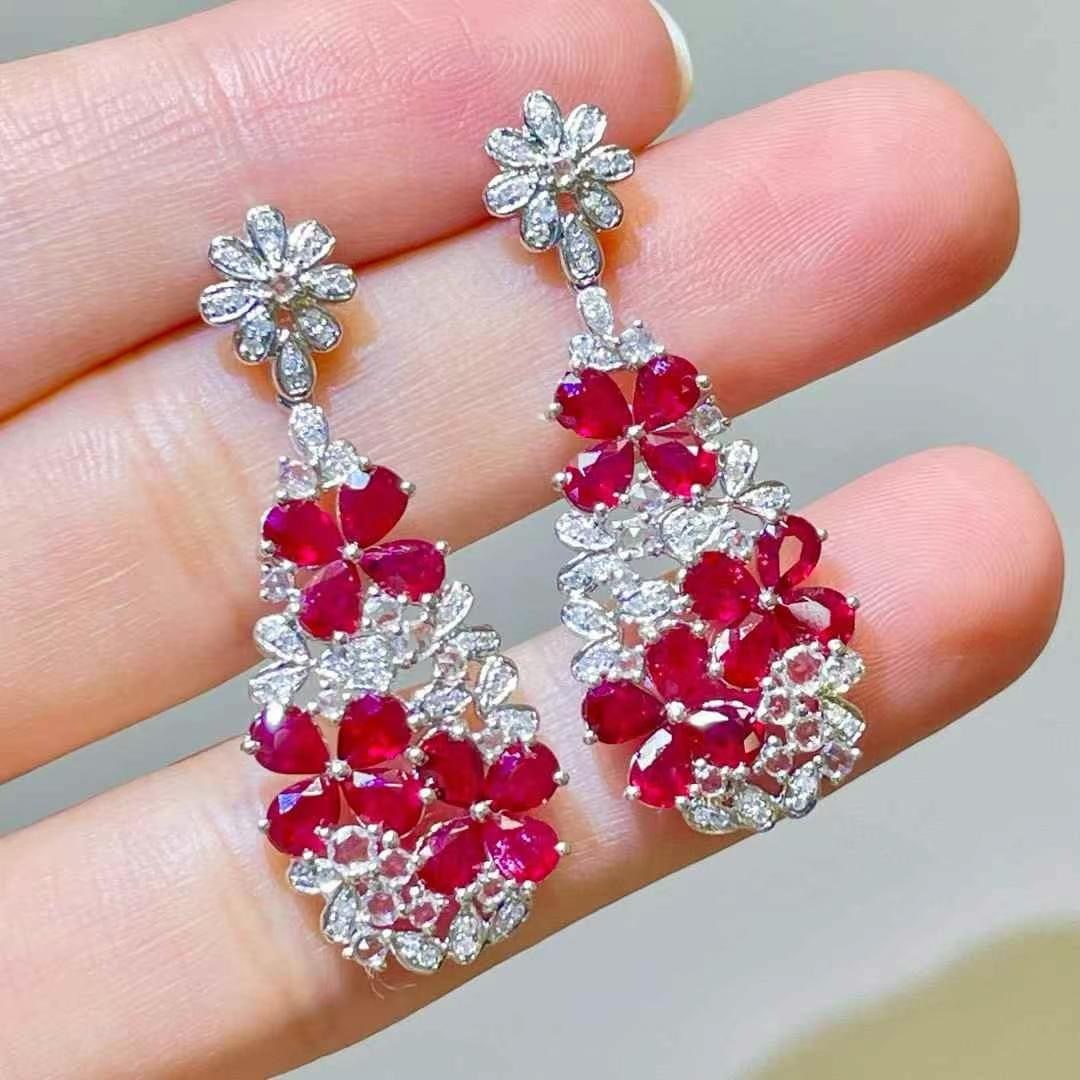 14k Gold 4.5 Ct Natural Ruby & Diamond Earrings: Ref:230968204 // gold content:14k gold // main gemstone:ruby // shape:pear // carat weight:4. 5ct // color:pigeonblood red // treatment:natural // // adjacent gemstone 2 : diamond // shape:round //