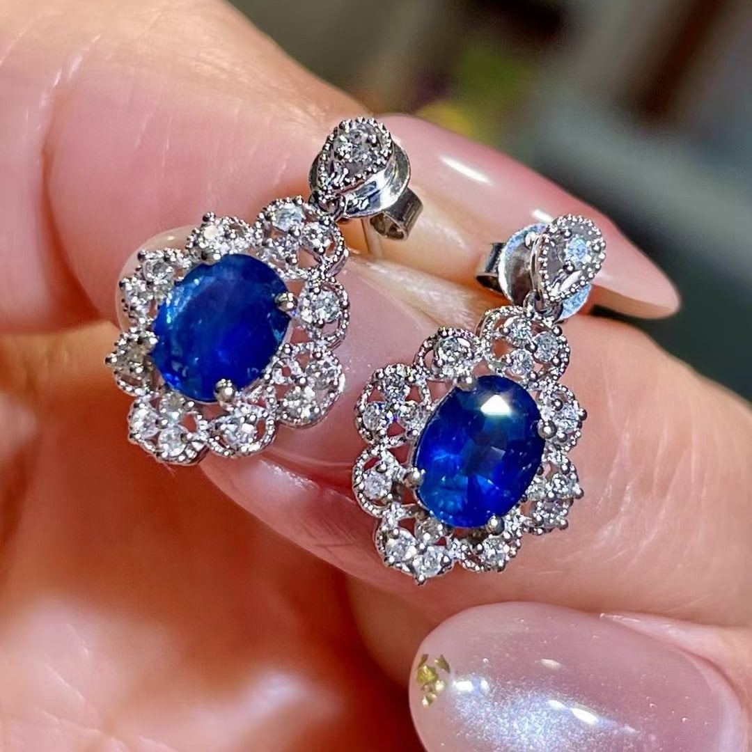 14k Gold 2.18 Ctw Vivid Blue Natural Sapphire & Diamond Earrings: Ref:230968287 // gold content:14k gold // main gemstone:sapphire // shape:oval // carat weight:1. 9ct // color:vivid blue // treatment:natural // // adjacent gemstone 2 : diamond // shape:round //