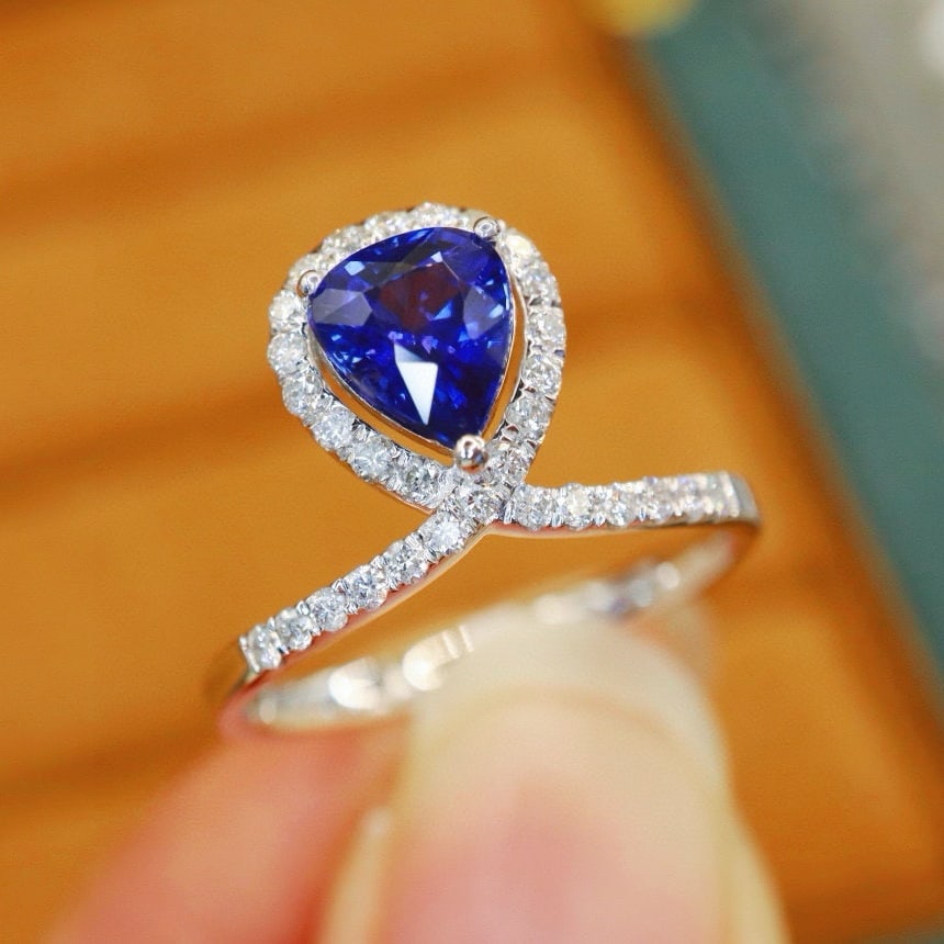 14k Gold 1.58 Ctw Natural Sapphire & Diamond Ring: Ref:230968303 // gold content:14k gold // ring size:7. 25us // // main gemstone:sapphire // shape:pear // carat weight:1. 28ct // color:royal blue // treatment:natural // // adjacent gemstone 2 :