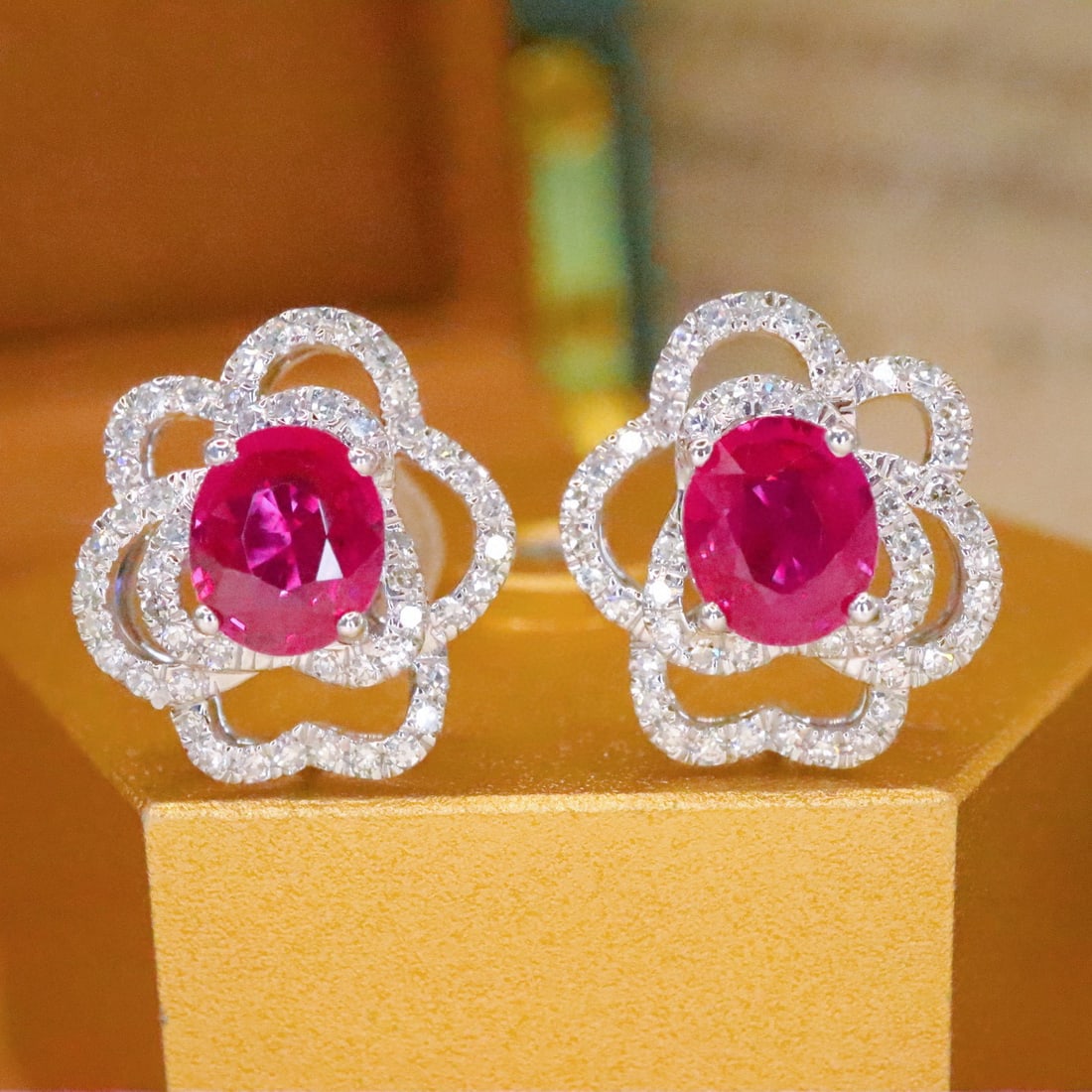 14k Gold 1.35 Ctw Natural Ruby & Diamond Earrings: Ref:230968321 // gold content:14k gold // main gemstone:ruby // shape:oval // carat weight:1. 05ct // color:red // treatment:natural // // adjacent gemstone 2 : diamond // number of stones:100 //