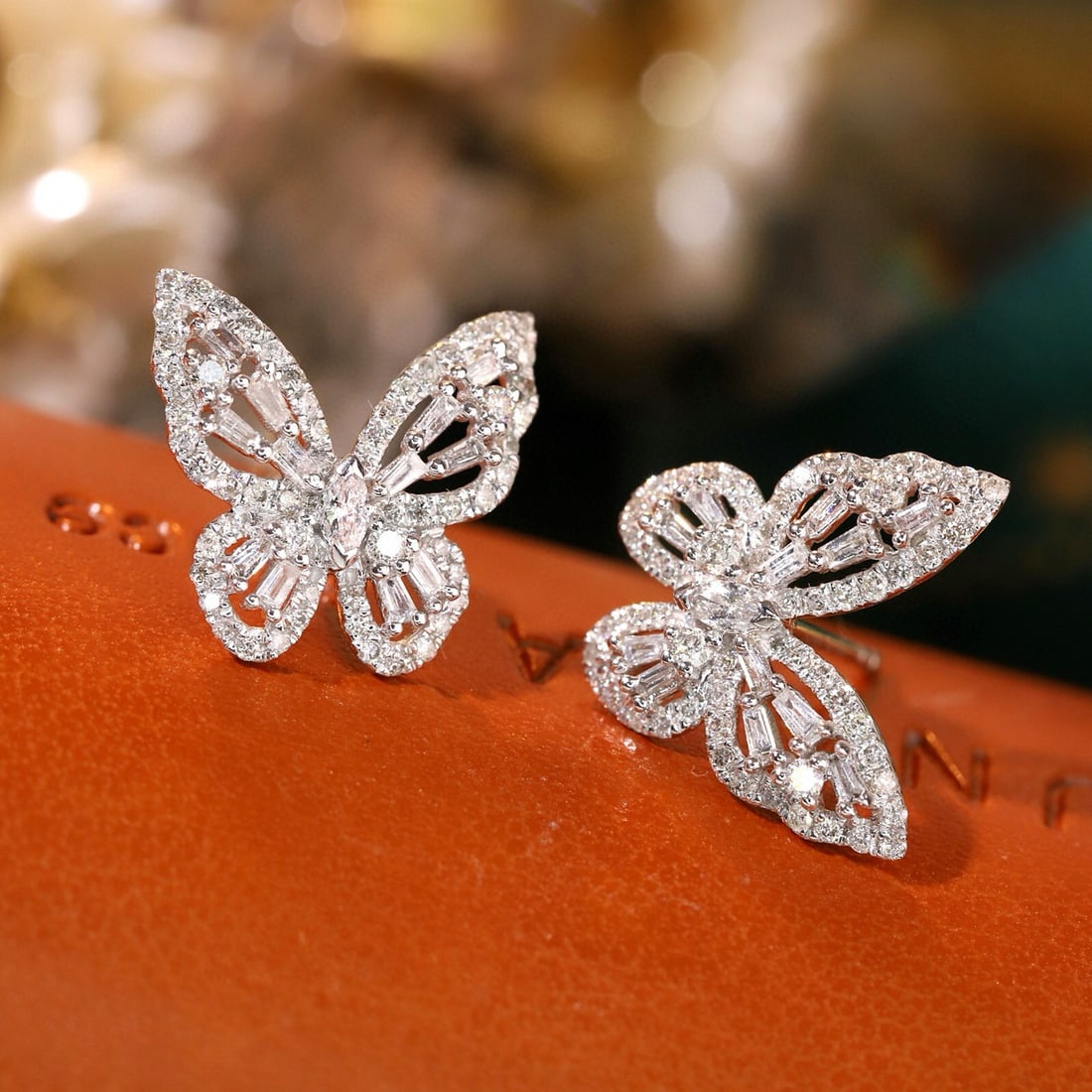 14k Gold 0.64 Ct Natural H Diamond & Butterfly Earrings: Ref:230968378 // gold content:14k gold // main gemstone:diamond // shape:multiply // carat weight:0. 64ct // clarity grade:vs-si // color:h // treatment:natural // High Estimate: 4300 Condition: New