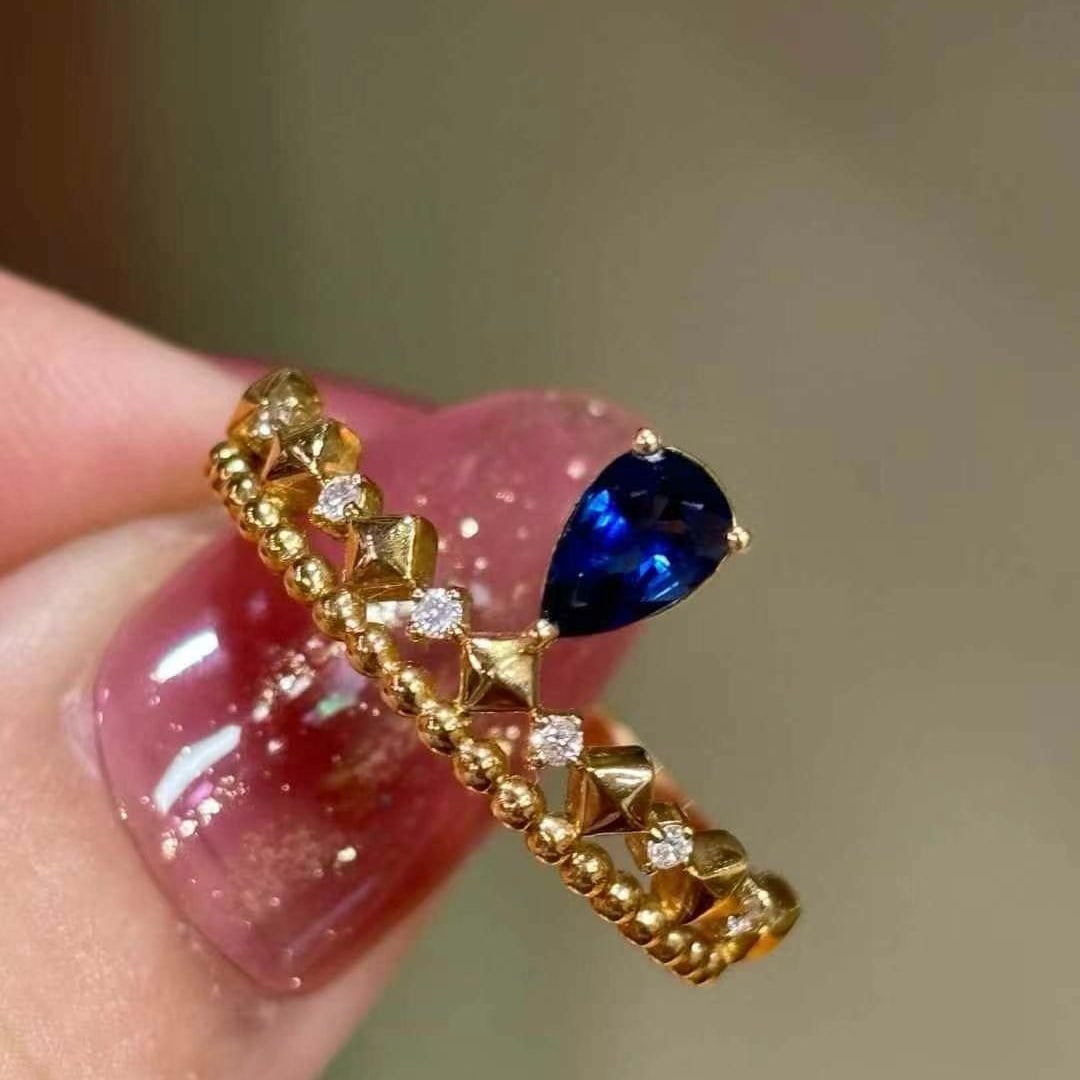 14k Gold 0.5 Ct Natural Sapphire & Diamond Ring: Ref:230968219 // gold content:14k gold // ring size:7. 25us // // main gemstone:sapphire // shape:pear // carat weight:0. 5ct // color:blue // treatment:natural // // adjacent gemstone 2 : diamond //