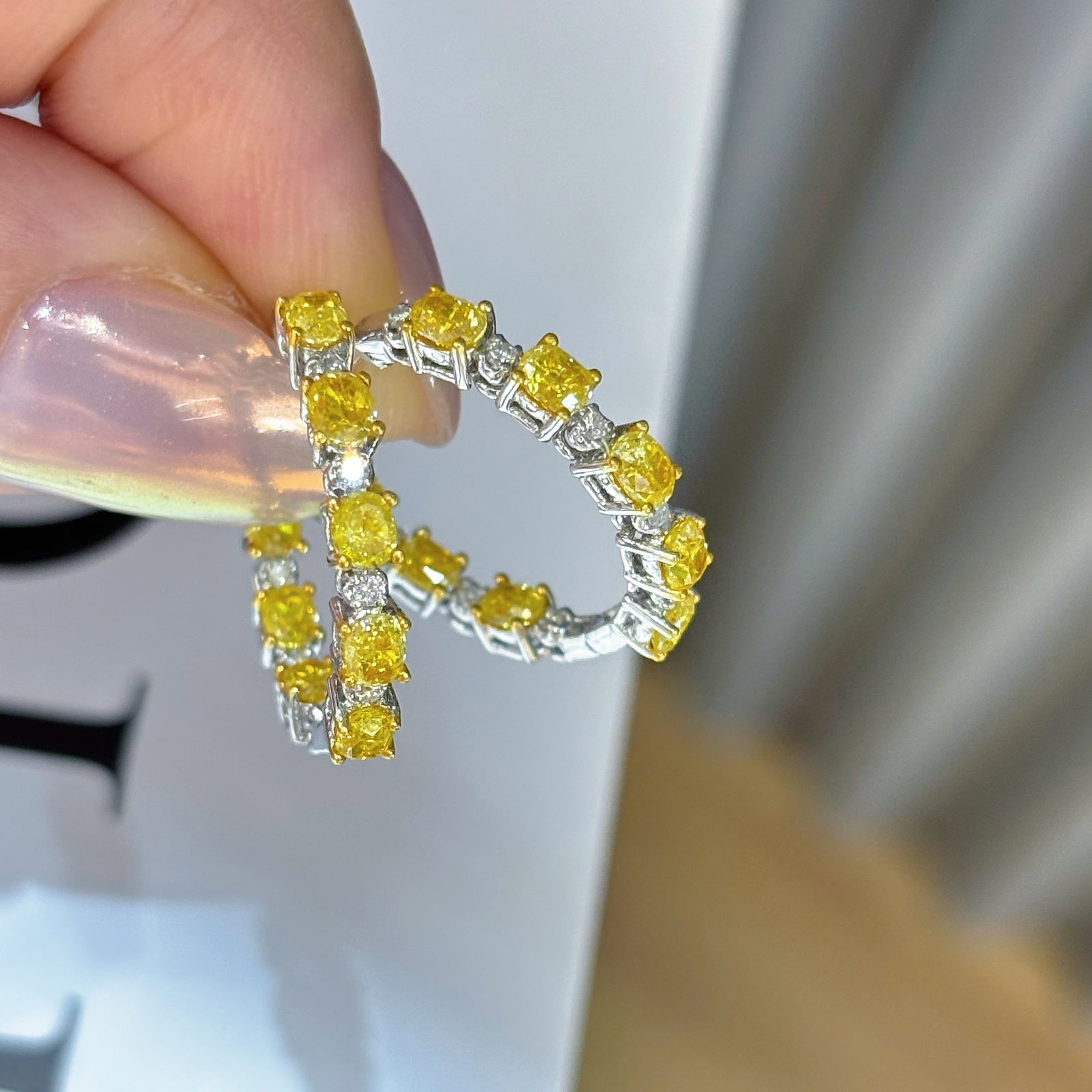 14k Gold 2 Ct Natural Yellow Diamond & Diamond Earrings: Ref:230968360 // gold content:14k gold // main gemstone:yellow diamond // shape:oval // carat weight:2ct // color:yellow // treatment:natural // // adjacent gemstone 2 : diamond // shape:round //
