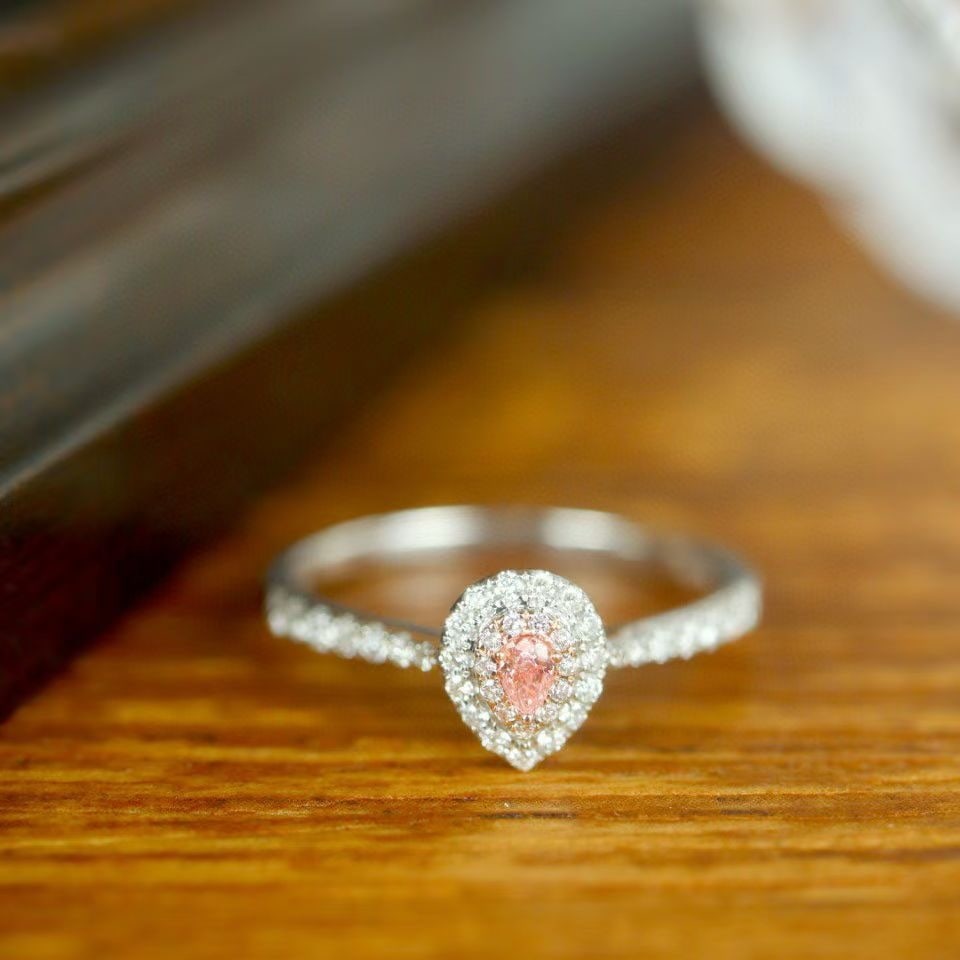 14k Gold 0.06 Ct Natural Pink Diamond & Diamond Ring: Ref:230968427 // gold content:14k gold // ring size:7. 25us // // main gemstone:pink diamond // shape:pear // carat weight:0. 06ct // color:pink // treatment:natural // // adjacent gemstone 2 :