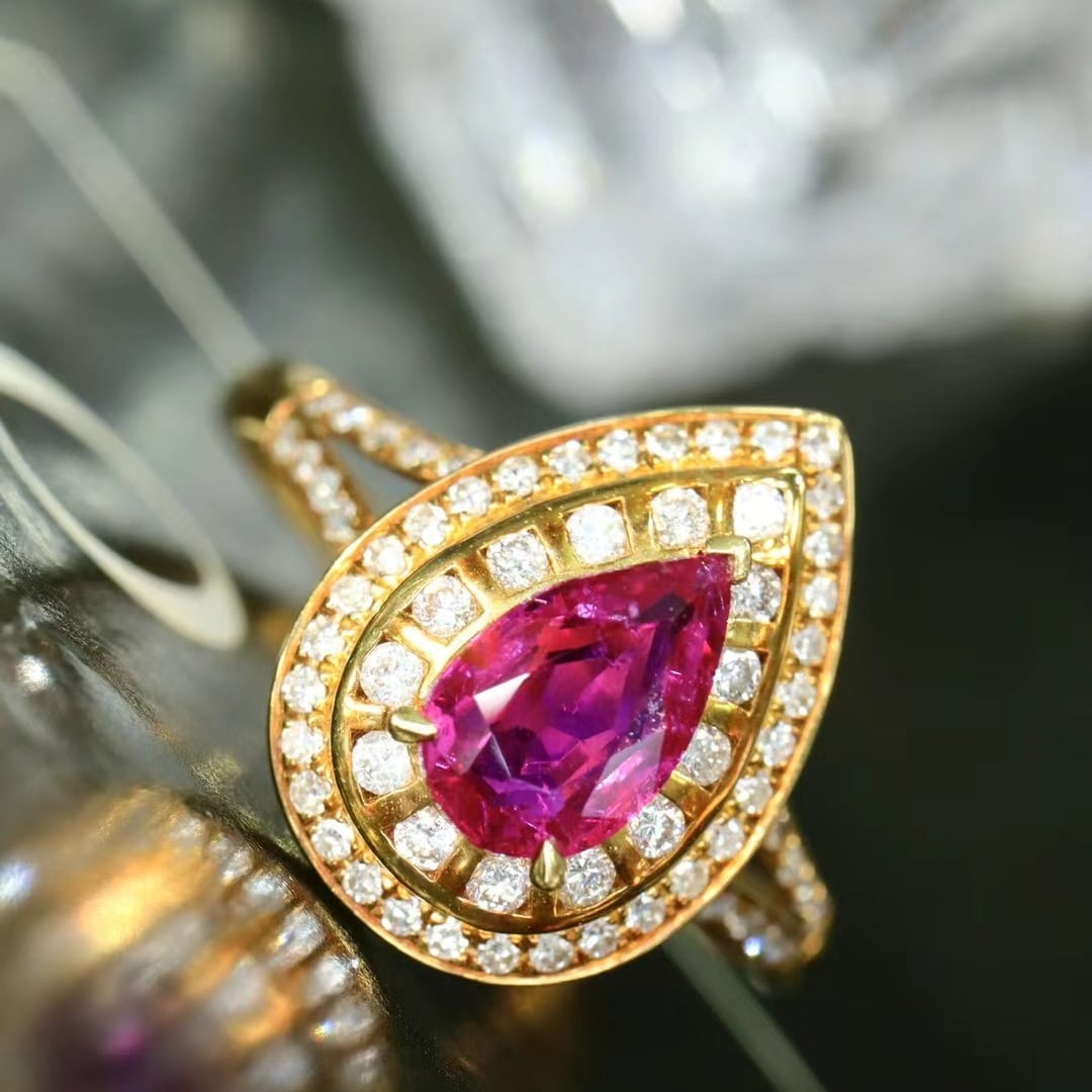 14k Gold 1.18 Ctw Natural Ruby & Diamond Ring: Ref:230968449 // gold content:14k gold // ring size:7. 25us // // main gemstone:ruby // shape:pear // carat weight:0. 84ct // color:red // treatment:natural // // adjacent gemstone 2 : diamond //