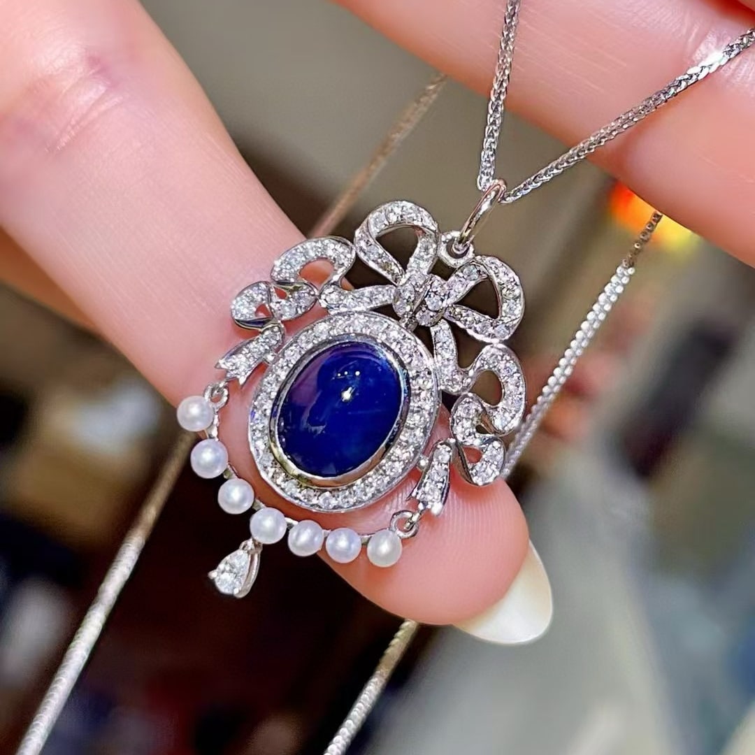 14k Gold 2.71 Ctw Natural Sapphire & Diamond Pendant( Without Chain ): Ref:230968280 // gold content:14k gold // main gemstone:sapphire // shape:oval // carat weight:2. 30ct // color:blue // treatment:natural // // adjacent gemstone 2 : diamond // shape:multiply //