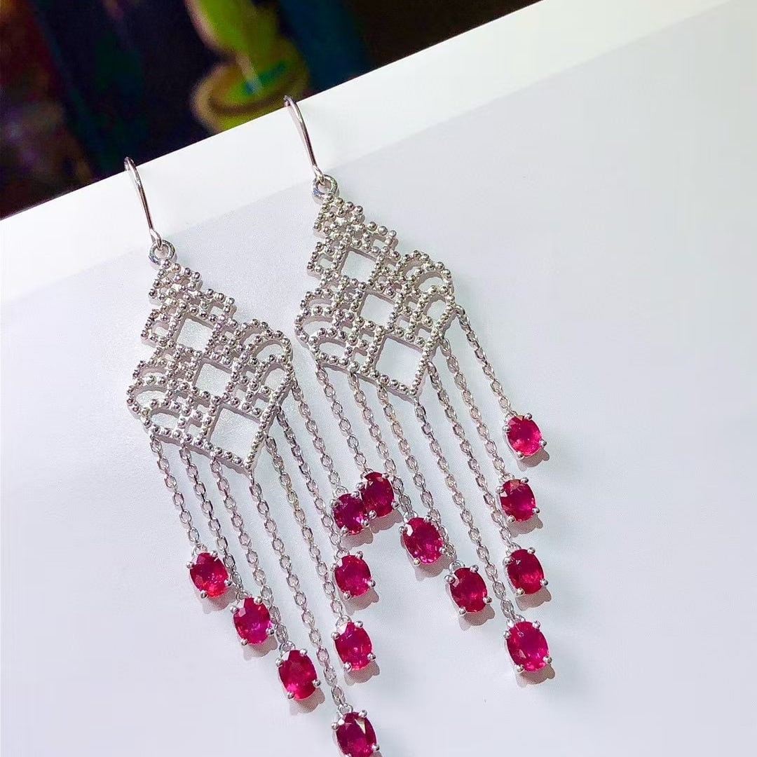 14k Gold 3.60 Ct Natural Ruby Earrings: Ref:230969012 // gold content:14k gold // main gemstone:ruby // shape:oval // carat weight:3. 60ct // color:red // treatment:natural // High Estimate: 6600 Low Estimate: 4400 Condition: New