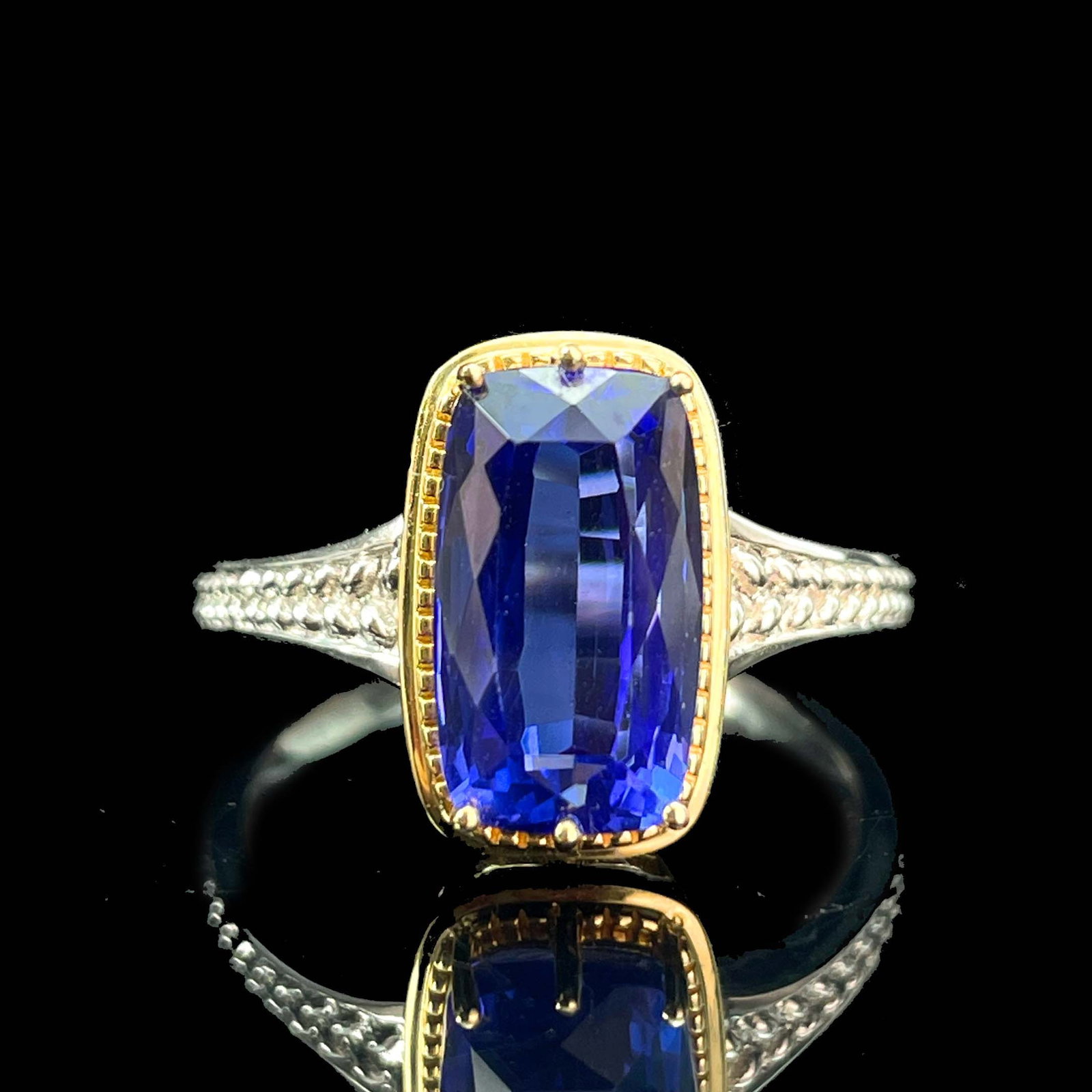 14k Gold 3.07 Ct Natural Tanzanite Ring: Ref:230969042 // gold content:14k gold // ring size:7. 25us // // main gemstone:tanzanite // shape:cushion // carat weight:3. 07ct // color:blue // treatment:natural // Low Estimate: 2400 Condition:
