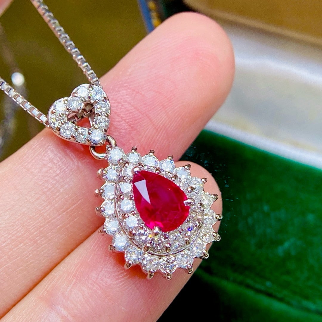 14k Gold 2 Ctw Natural Ruby & Diamond Pendant( Without Chain ): Ref:230968333 // gold content:14k gold // main gemstone:ruby // shape:pear // carat weight:1ct // color:red // treatment:natural // // adjacent gemstone 2 : diamond // shape:round // carat weight:1ct