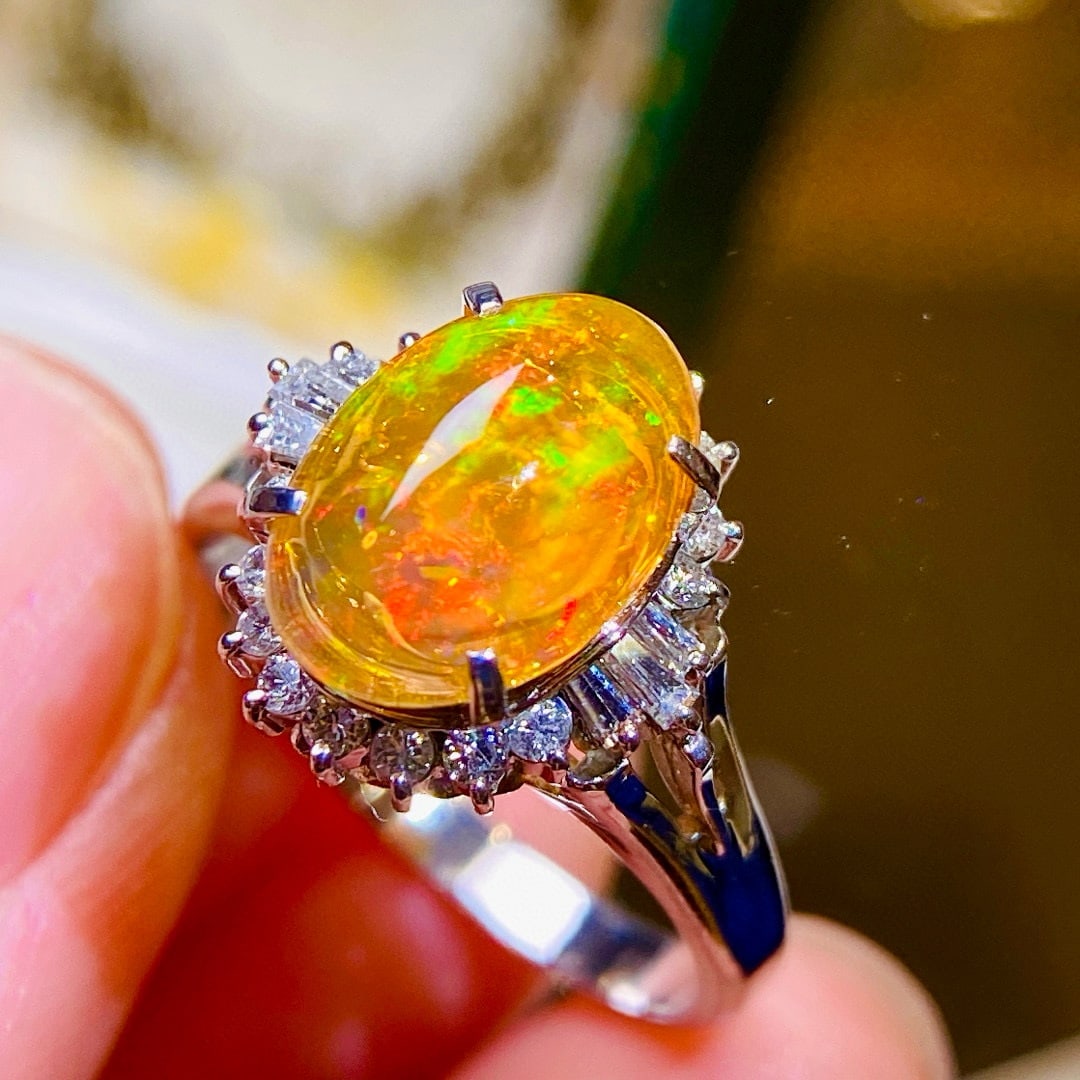 14k Gold 2.02 Ctw Natural Opal & Diamond Ring: Ref:230968337 // gold content:14k gold // ring size:7. 25us // // main gemstone:opal // shape:oval // carat weight:1. 73ct // color:color // treatment:natural // // adjacent gemstone 2 : diamond //