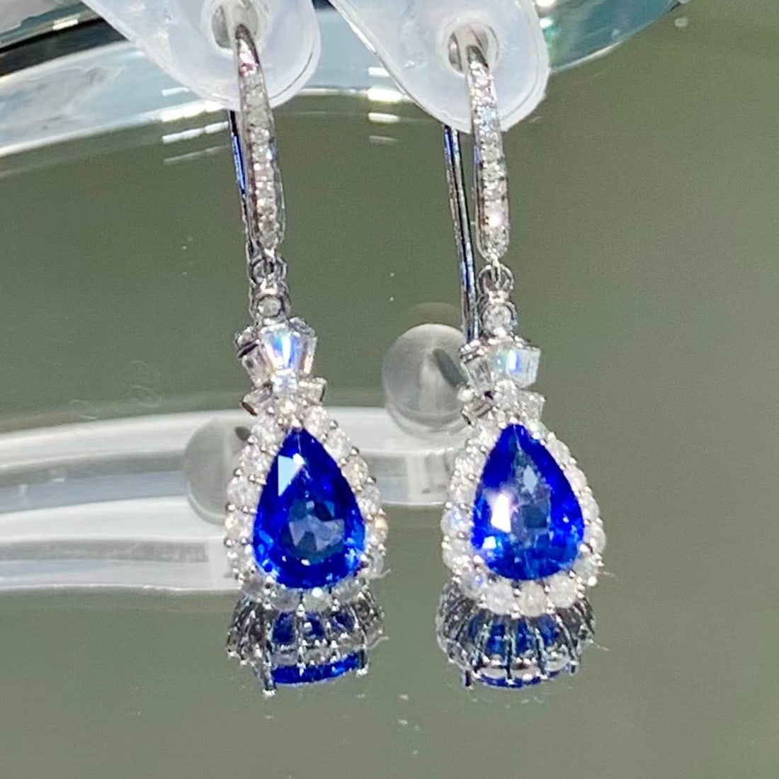 14k Gold 1.5 Ct Natural Sapphire & Diamond Earrings: Ref:230969028 // gold content:14k gold // main gemstone:sapphire // shape:pear // carat weight:1. 5ct // color:royal blue // treatment:natural // // adjacent gemstone 2 : diamond // shape:multiply //