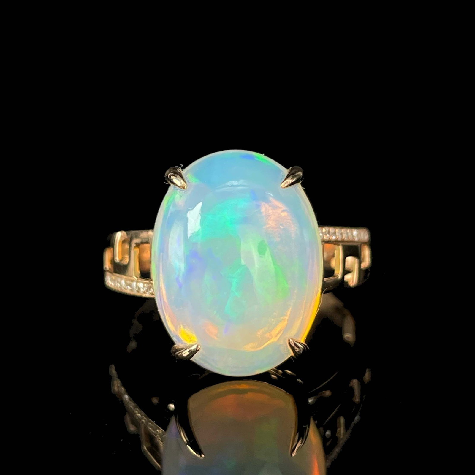14k Gold 7.1 Ct Natural Opal & Diamond Ring: Ref:230969057 // gold content:14k gold // ring size:7. 25us // // main gemstone:opal // shape:oval // carat weight:7. 1ct // color:color // treatment:natural // // adjacent gemstone 2 : diamond //