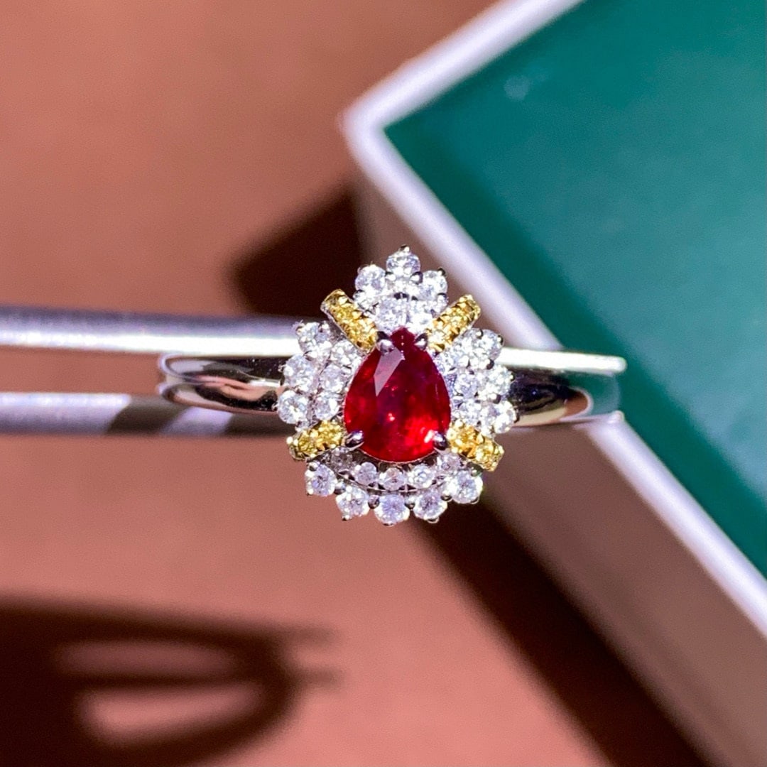 14k Gold 0.62 Ctw Natural Ruby & Diamond Ring: Ref:230968403 // gold content:14k gold // ring size:7. 25us // // main gemstone:ruby // shape:pear // carat weight:0. 37ct // color:pigeonblood red // treatment:natural // // adjacent gemstone 2 :