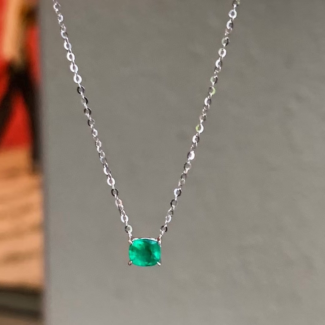 14k Gold 0.53 Ct Vivid Green Natural Emerald Necklace: Ref:230969127 // gold content:14k gold // main gemstone:emerald // shape:cushion // carat weight:0. 53ct // color:vivid green // treatment:natural // High Estimate: 5300 Low Estimate: 3500 Condition: